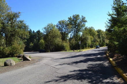 Main road into the park - gravel lot on the left for sports field and trail parking
